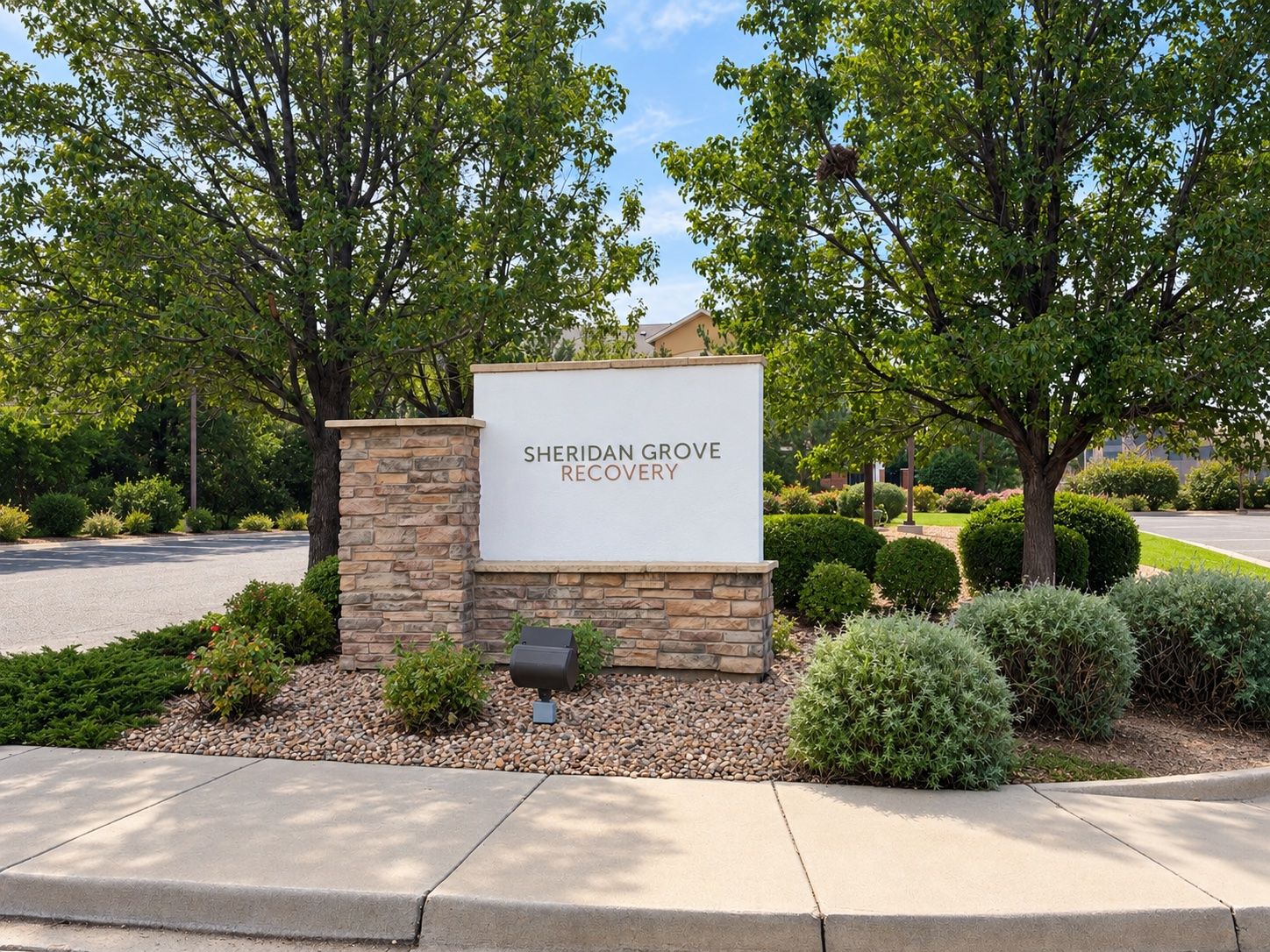 Sheridan Grove Recovery entrance sign from the sidewalk